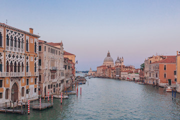 Fototapeta na wymiar Grand Canal and Santa Maria della Salute in Venice, Italy from the Ponte dell'Accademia