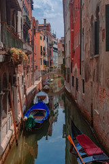 Venetian buildings by canal in Venice, Italy