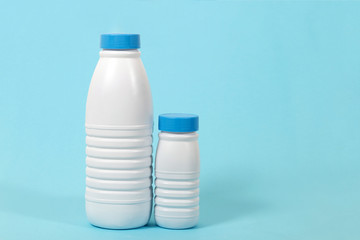 full plastic bottles of milk