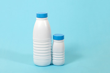 full plastic bottles of milk