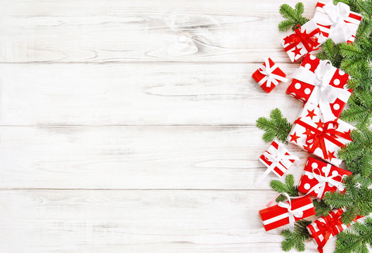 Gift boxes Christmas tree branches decotation