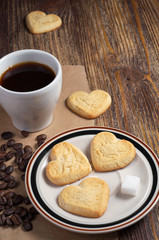 Shortbread cookies in shape of heart and coffee