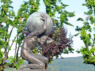 Statue of Atlas with the globe on his shoulders in Arona, Lago Maggiore, Italy