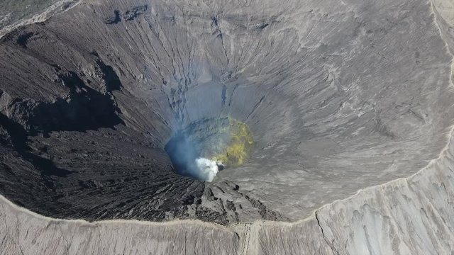 volcano crater contain sulfur and still active. footage captured from aerial view