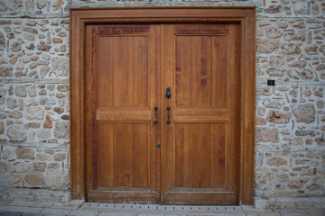 old wooden windows on stone brick wall in Atalanta, turkey 