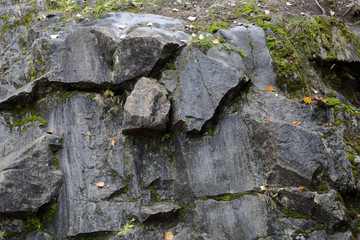 Original textured surface of of a natural coarse stone
