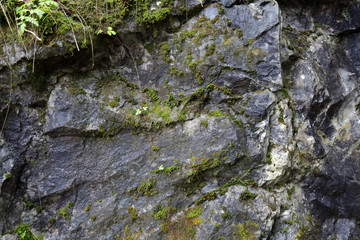 Original textured surface of of a natural coarse stone
