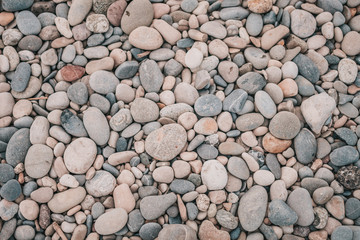 Cagnes-sur-Mer, France, September 23, 2018: Pebbles closeup on the seashore