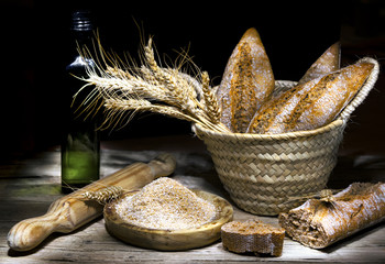 Fresh wholemeal bread with flour and wheat ears