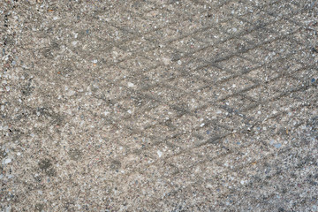 Concrete background with .rhombus design, grey