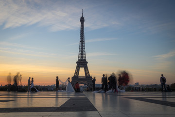 Fototapeta na wymiar Paris, France - 10 13 2018: View of the Eiffel Tower from The Trocadero at sunrise