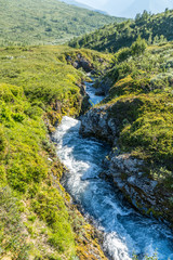 Fast mountain river valley in Norwegian Highlands	