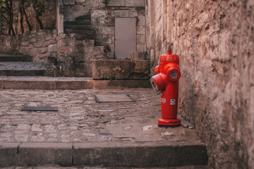 Les Baux-de-Provence, France, September 24, 2018: Red fire hydrant in the street