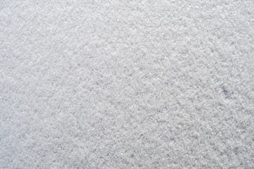 snow background on car hood