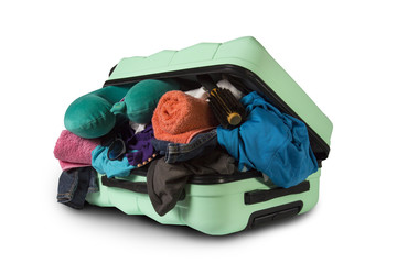 Plastic suitcase with wheels, overflowing things on a white background. Travel concept, vacation trip, visit to relatives
