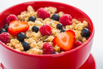 Bowl of Granola, Blueberries, Raspberries and Strawberries