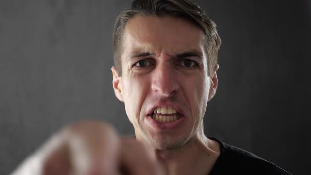 Angry Man Screaming and Expressing Anger and Disagreement.