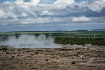 Geysir geyser in Iceland in summer  -  stopped erupting due to polution caused by tourists