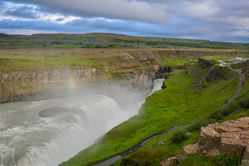 Fototapeta na wymiar Gullfoss waterfall with rainbow in summer in Iceland, Europe