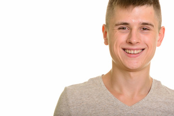 Close up of young happy Caucasian man smiling
