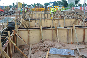Timber form work made from plywood and timber constructed by workers at the construction site. 