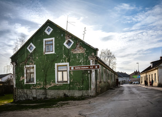 Green colored building on the streets of Sabile, Latvia. Sabile is a small town famous for its delicious cider. Shot in April 2015.