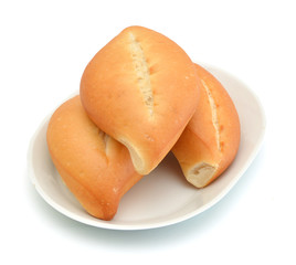 Breads in plate on a white background