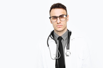 cheerful joyful doctor in white robe and stethoscope on neck looking at camera isolated on white background