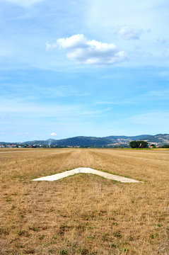 A grass landing runway on an airfield