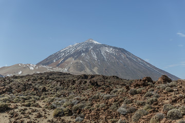 Arid view of a lava landscape in front of the Teide volcano on the island of Tenerife