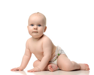 Infant child baby girl toddler crawling in diaper  isolated on a white