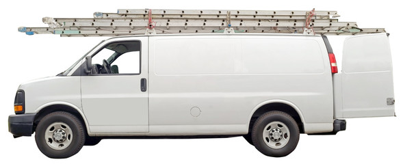 Maintenance van with open rear door and ladders parked in residential neighborhood. Nobody. Isolated. © Noel