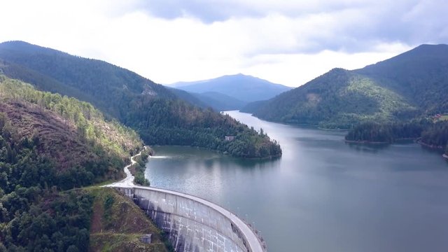 Picturesque Aerial Drone Shot of the Waters and Mountains of Valea Draganului.