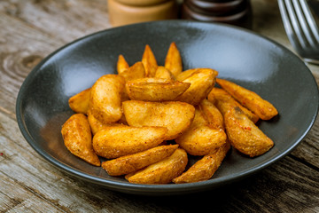 The potatoes wedges on the Board