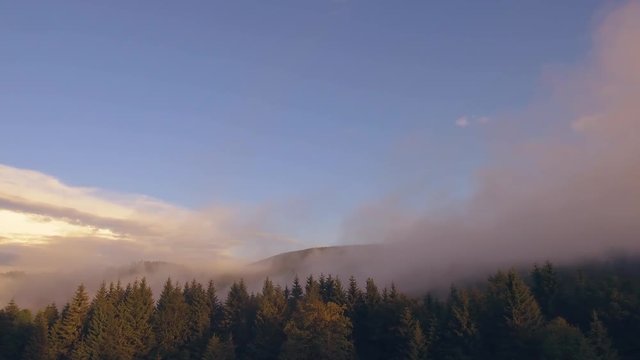 Nice Aerial Drone Shot Panning the Romanian Mountains with Moving Valley Fog