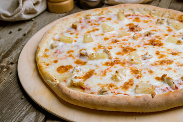 pizza Hawaiian with pineapple and chicken