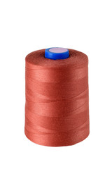 orange spool of threads isolated on white background