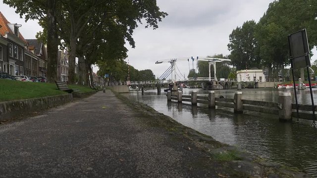 A Picturesque Landscape of an Amsterdam Waterfront and Bridge