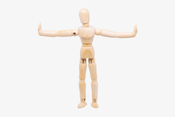 Wooden figure making stop gesture with her hand