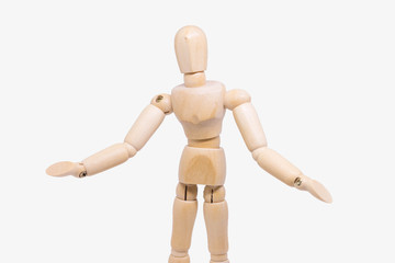 A wooden mannequin isolated against a white background
