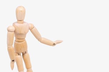 A wooden mannequin isolated against a white background