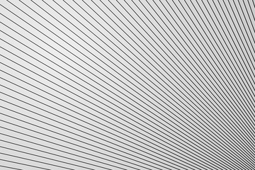 Diagonal line structure on white plastic wall surface, abstract background
