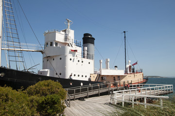 Albany Australia, historic whaling boat moored at wooden dock 