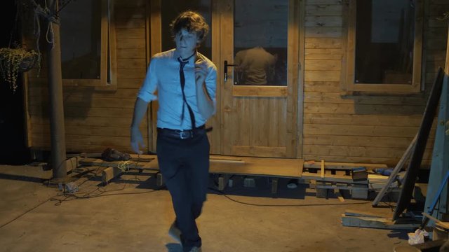 Young man dancing outdoors swing dance