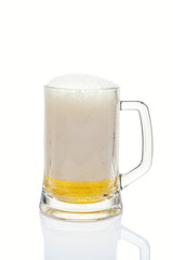 Beer in glass on a white background.
