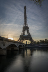Fototapeta na wymiar Paris, France - 10 13 2018: The Eiffel Tower from the Iena Bridge, at sunrise