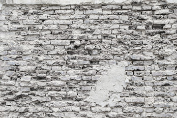 Cracked old white bricks wall background
