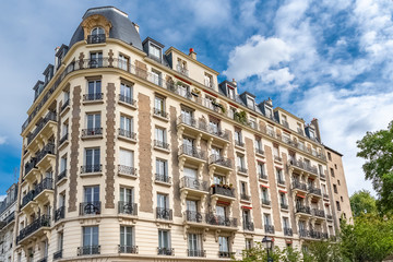 Fototapeta na wymiar Paris, beautiful building in Montmartre, typical parisian facade avenue Junot 