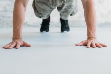 workout and exercise. man doing push ups. athletic lifestyle and training.