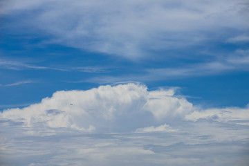 Rain clouds forming with blue sky background